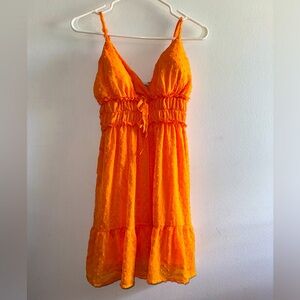 Beautiful bright orange dress with v neck and push up cups for beachy days